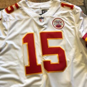 Brand new with tags Patrick Mahones jersey!